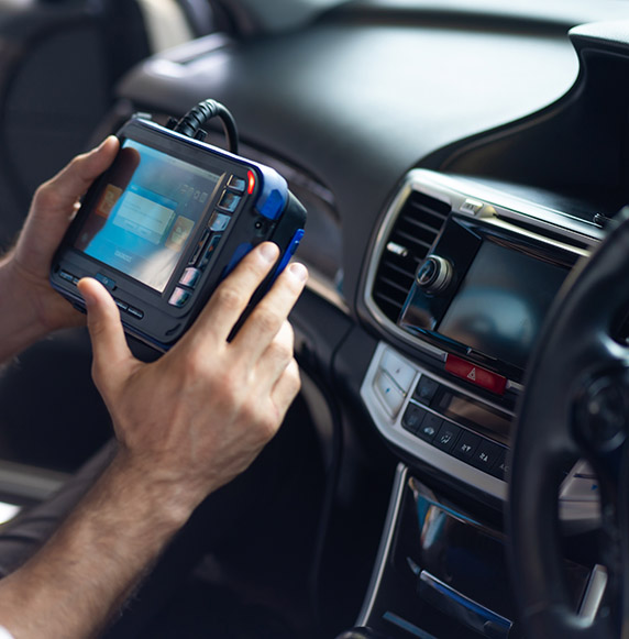 Professional car mechanic repair service and checking car engine